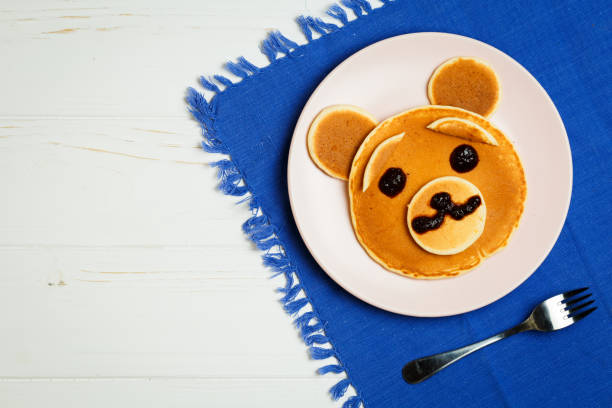 istock Baby bear on a pink plate 871357932