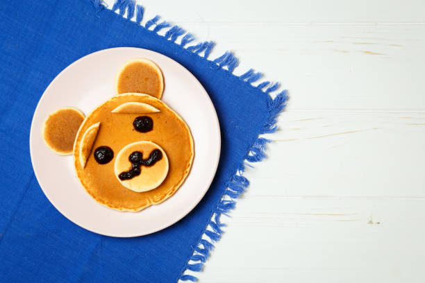istock Baby bear on a pink plate 871358014