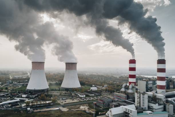 istock White smoke over power plant. 871359074