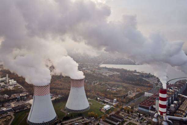 istock White smoke over power plant. 871361378