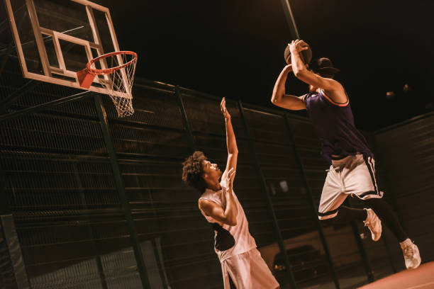 istock Guys playing basketball 871361886