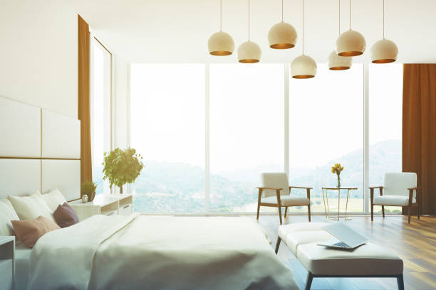 istock White and beige bedroom close up side toned 871364746