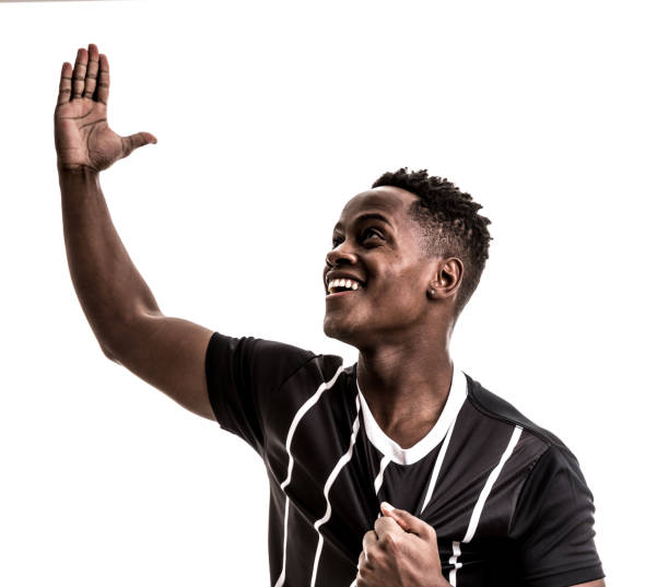 istock Fan / Sport Player on black and white uniform celebrating on white background 871369928