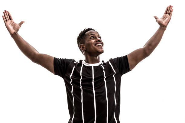 istock Fan / Sport Player on black and white uniform celebrating on white background 871370002