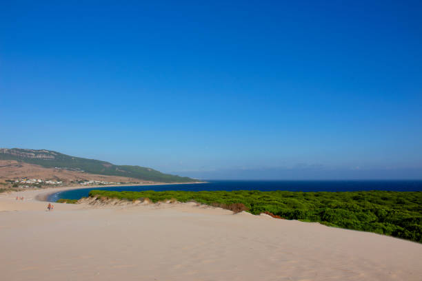 Beach. Beach. Summer beach view. Beach Bologna, Tarifa, Spain. Picture taken – 2 september 2017. luz solar stock pictures, royalty-free photos & images