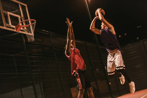 istock Guys playing basketball 871375970