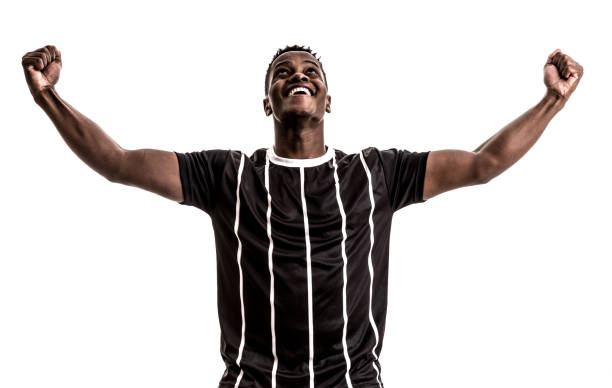 istock Fan / Sport Player on black and white uniform celebrating on white background 871375994