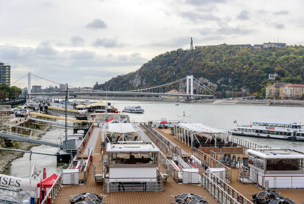 BUDAPEST, HUNGARY - OCTOBER 27, 2017: Cruise ship and panoramic view of Danube in Budapest