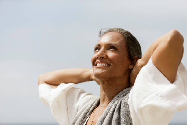 istock Portrait of smiling woman. 871379344