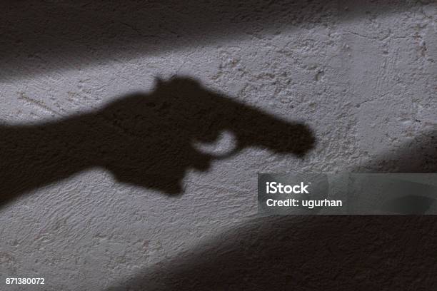 Shadow And Gun Stock Photo - Download Image Now - Gun, Handgun, Weapon