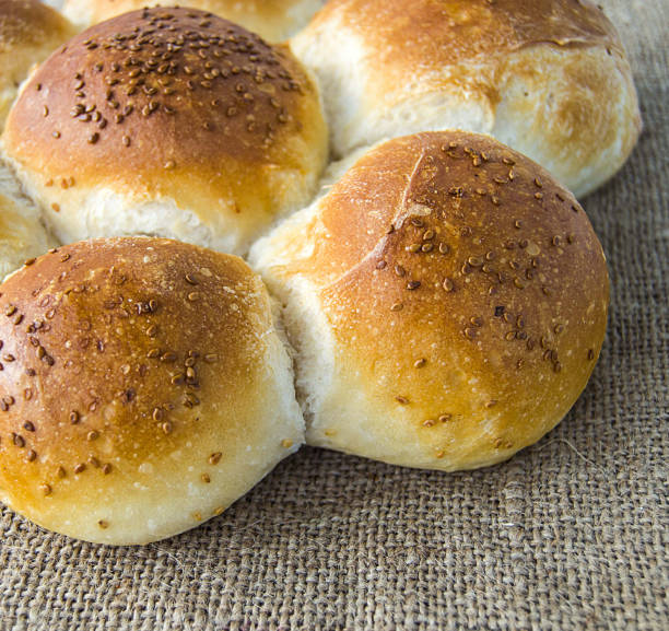 istock world bread varieties, different types of bread on wooden floor 871388006