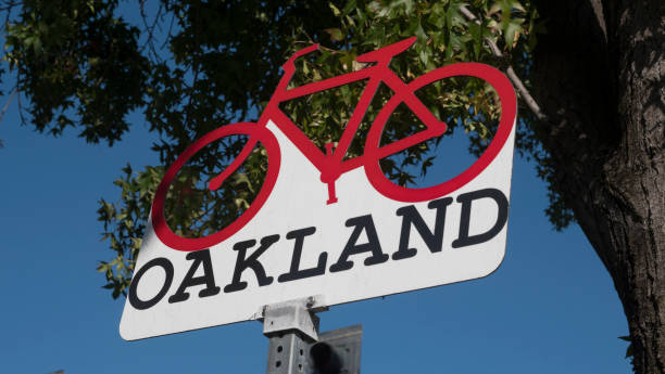 Oakland California Sign Oakland California Sign with bicycle oakland california stock pictures, royalty-free photos & images