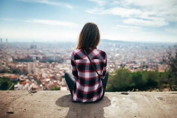 Photo of young woman enjoying Barcelona city