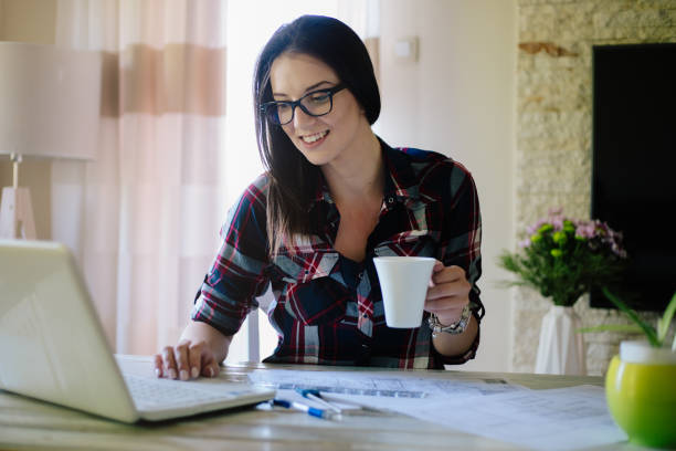 istock Woman working on new project from home 871395704