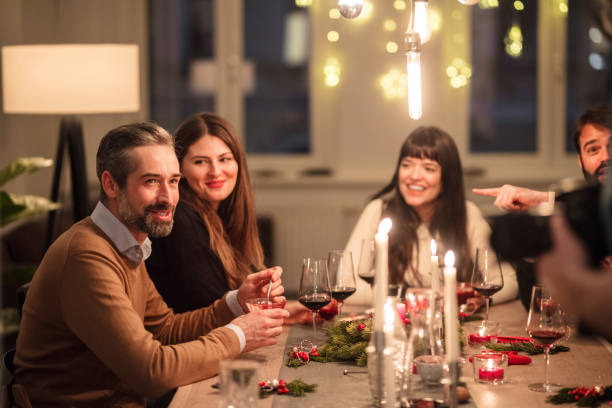istock Christmas Party with friends 871396034