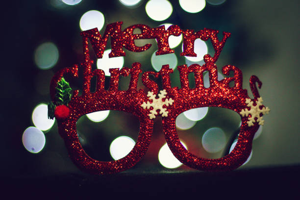 christmas eyeglasses with light background new year,christmas,eyeglasses,reindeer,happy,light,bokeh vintage nerd with reindeer sweater stock pictures, royalty-free photos & images