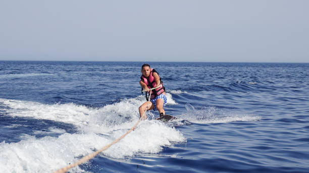 istock Man wakeboarder at sea in summer 871401936