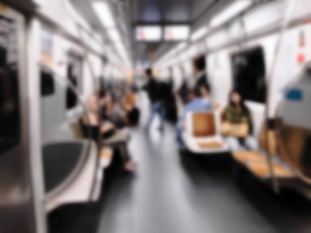 istock People inside the train wagon at subway station. 871405970