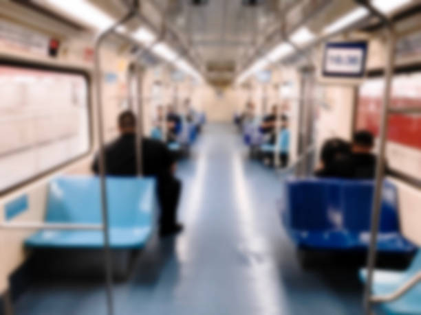istock People inside the train wagon at subway station. 871406206