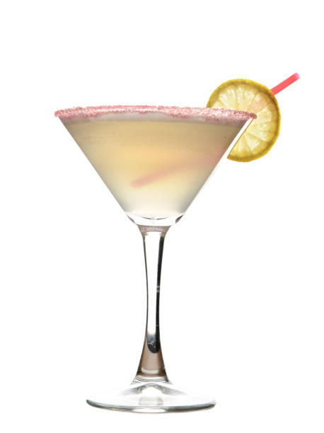 istock Yellow cosmopolitan cocktail decorated with citrus lemon and red straw 871406884