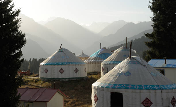 istock Yurts in front of Tianshan lake Xinjiang, China 871410708