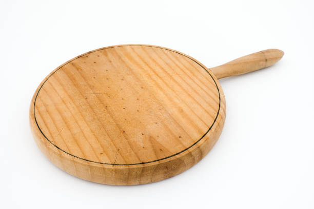 istock Worn round wooden chopping board empty for mockup 871412982