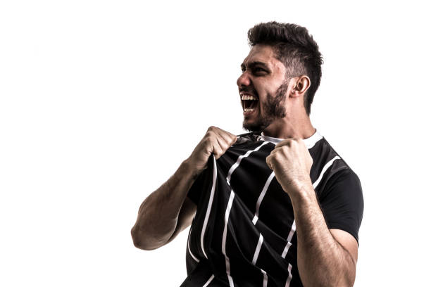 istock Fan / Sport Player on black and white uniform celebrating on white background 871413726