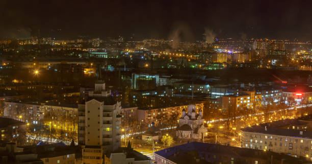 istock Panoramic view of  big city at night with illuminated modern architecture 871417754