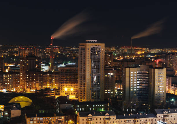istock Panoramic view of  big city at night with illuminated modern architecture 871417876