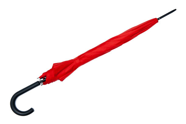 istock Red umbrella isolated on the white background 871421124