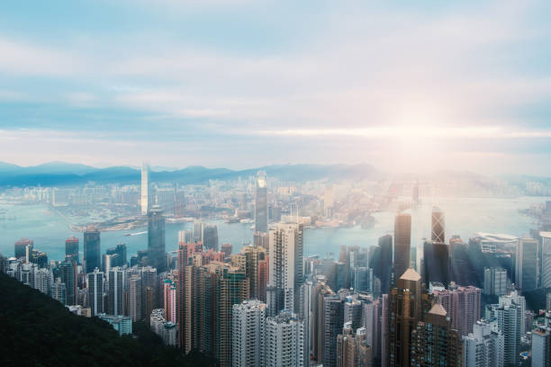 istock Victoria harbor Hong Kong at  sunset 871421618