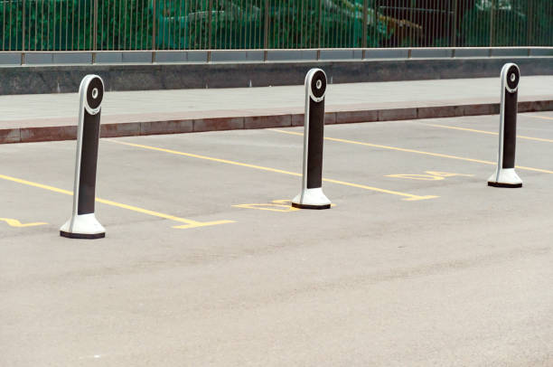 istock Columns designating parking spaces for important people. VIP 871424260