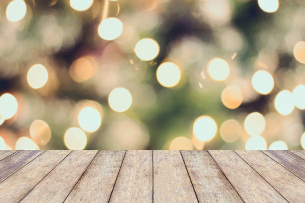 istock Christmas holiday background with empty wooden table 871427740