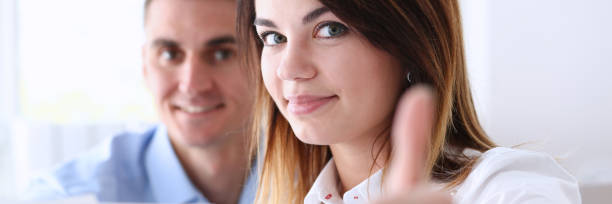 istock Female hand showing ok or approval sign with thumb 871428134