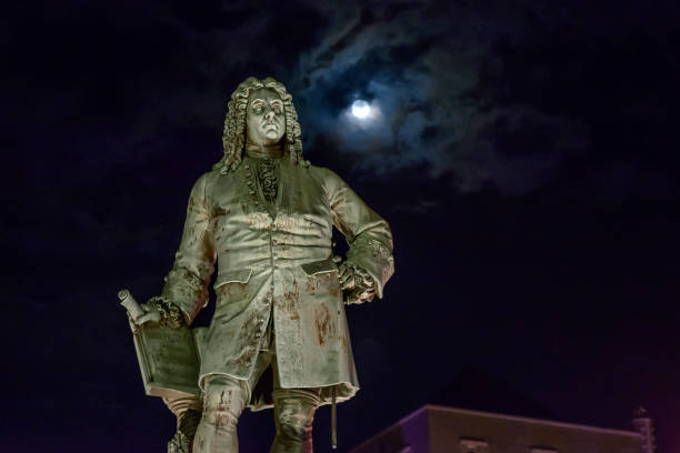 Monument to George Frideric Handel in Halle, Germany, at night.