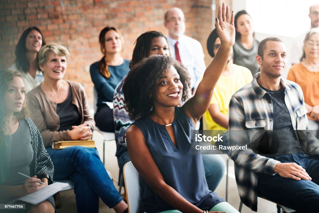 A group of diverse audience in a meeting Adult Stock Photo