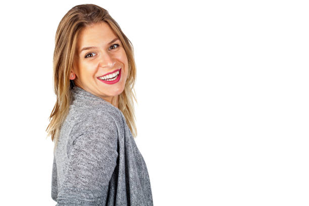 istock Happy woman pointing to copy space 871471026