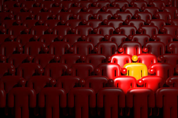 S yellow figure standing out a red crowd.