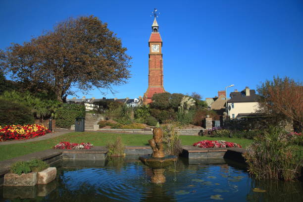 Victorian Clock Tower in Seaton Jubilee Gardens with iconic Victorian Clock Tower in Seaton, East Devon Devon stock pictures, royalty-free photos & images