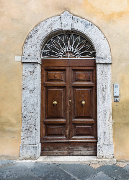 istock Massive wooden doors typical of southern Italy 871479346