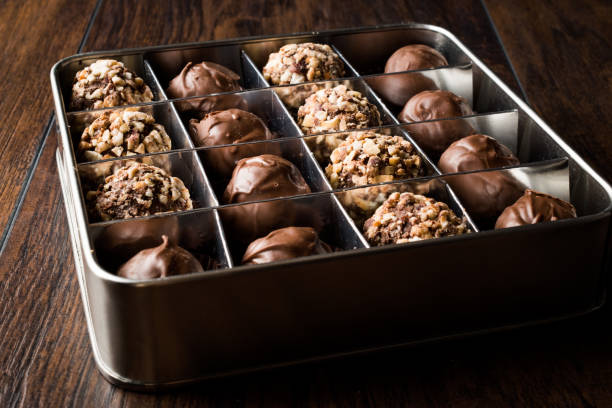 istock Box of Chocolate Pralines with Hazelnuts. 871483162