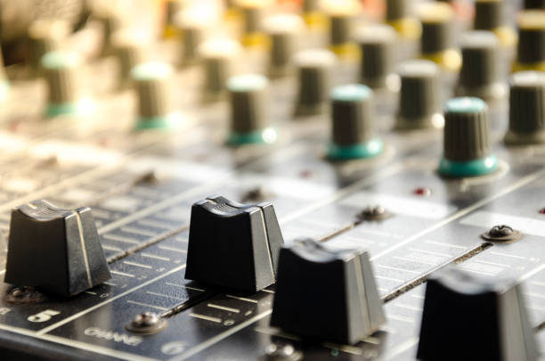 istock The audio equipment, control panel of analog studio mixer, front view. Close-up, selected focus 871483358