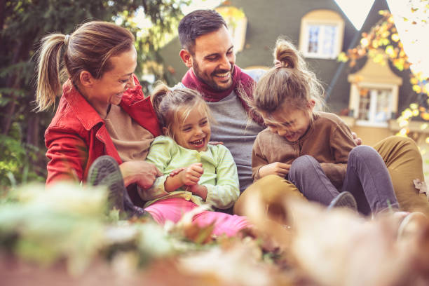 istock Parents with children have fun at backyard. 871484006