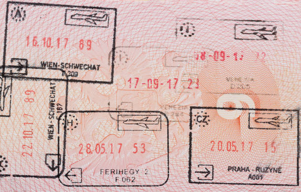 Inside page of a well traveled russian passport with stamps from different european customs: Hungary, italy, Austria, Czech Republic. Inside page of a well traveled russian passport with stamps from different european customs: Hungary, italy, Austria, Czech Republic Traveled stock pictures, royalty-free photos & images