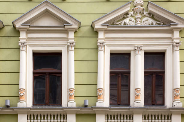 istock Facade vintage houses with columns 871489676