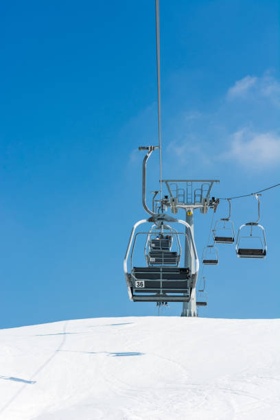 istock Ski lift at skiing resort. 871491048