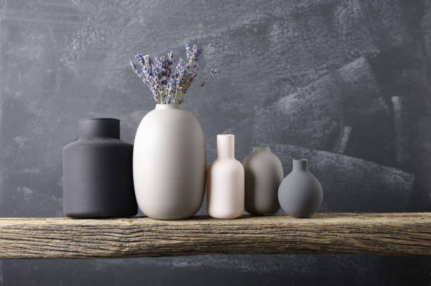 istock Various vases on wooden shelf 871496868