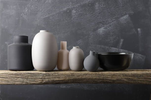 istock Neutral colored crockery on wooden shelf 871497036