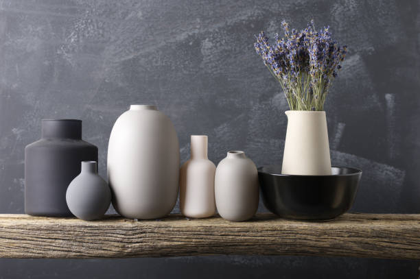 istock Neutral colored crockery on wooden shelf 871497056