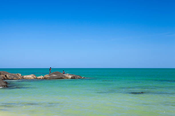 fisherman are fishing at Khaolak beach, Phang Nga, Thailand
